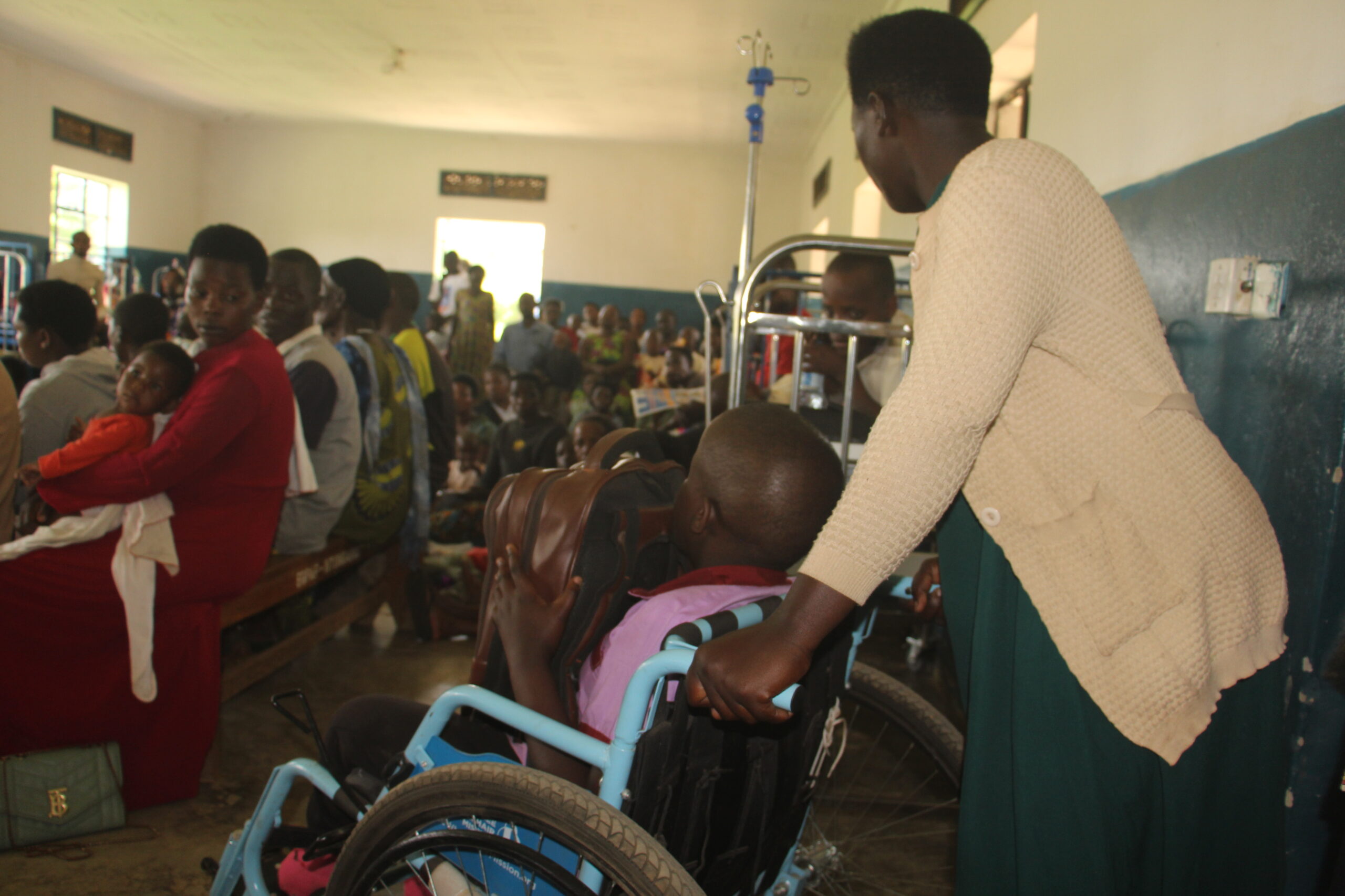 A mother helps her Hydrocephalus conditioned Child during a medical camp at Kitwe Health Centre in October.